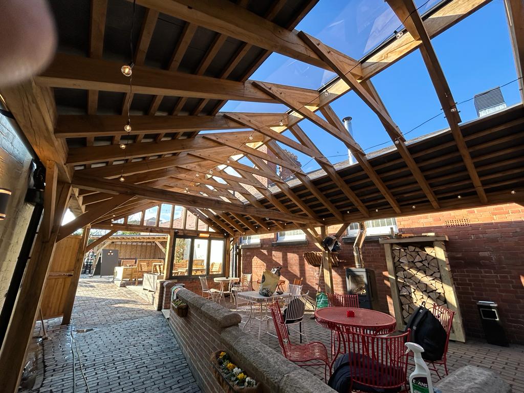 Oak Cut Roof with slate and glass covering 